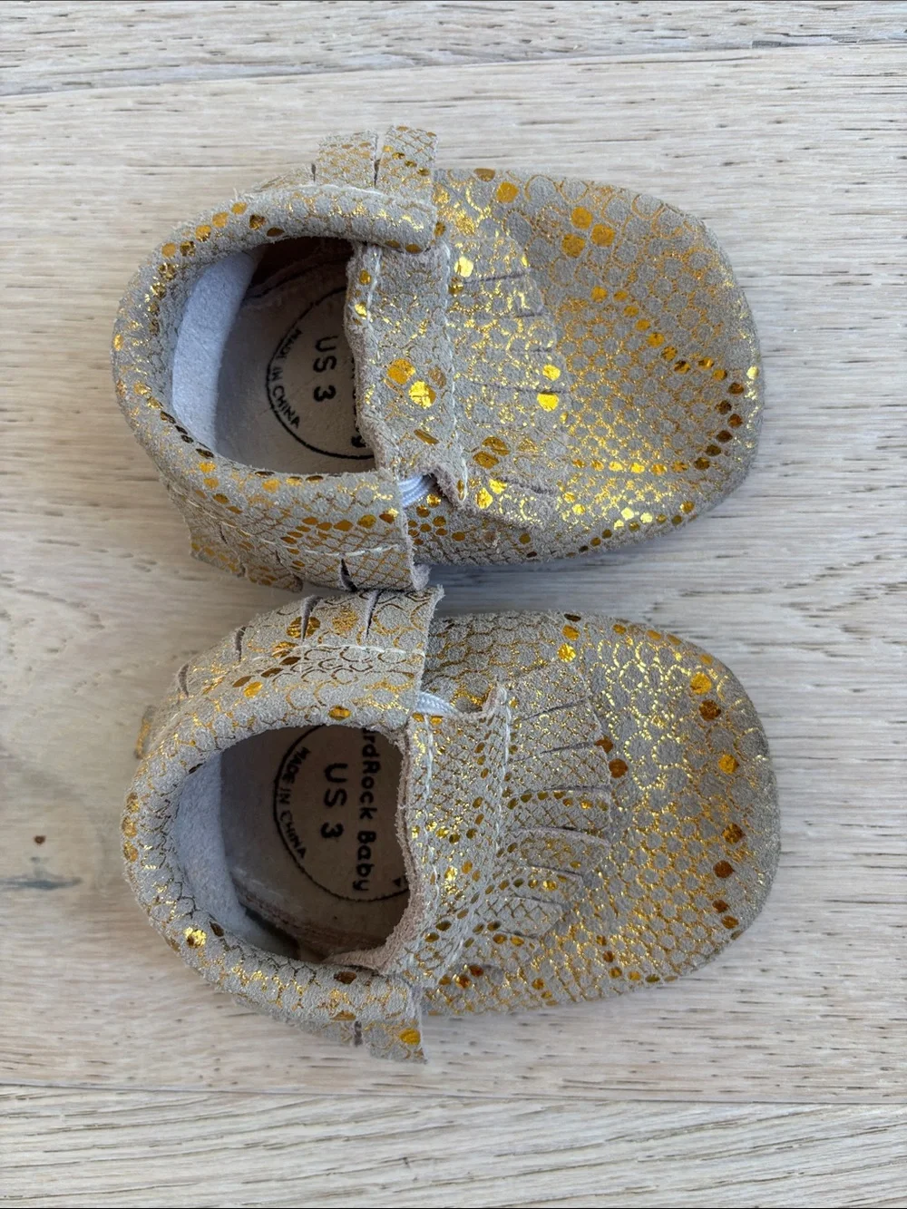 BirdRock Baby Gold Glitter Fringe Baby Moccasins with Metallic Accents